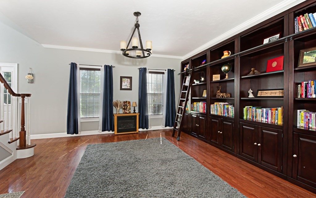 137 Osgood Road Charlton, MA 01507 - Photo 29 of 41 a view of a livingroom with furniture and staircase