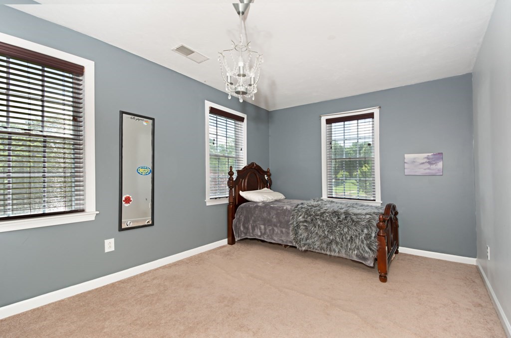 137 Osgood Road Charlton, MA 01507 - Photo 35 of 41 a living room with furniture and a window