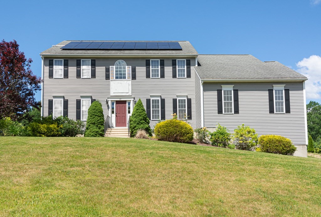 137 Osgood Road Charlton, MA 01507 - Photo 6 of 41 a front view of a house with garden