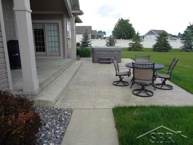 7089 Hupfer Road Freeland, MI 48623 - Photo 31 of 37 Patio with Hot Tub