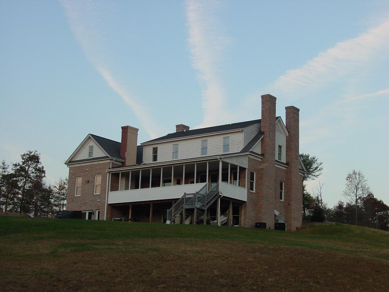 300 Frying Pan Hollow Road Ferrum, VA 24088 - Photo 3 of 7 a view of a white house with a big yard and large trees
