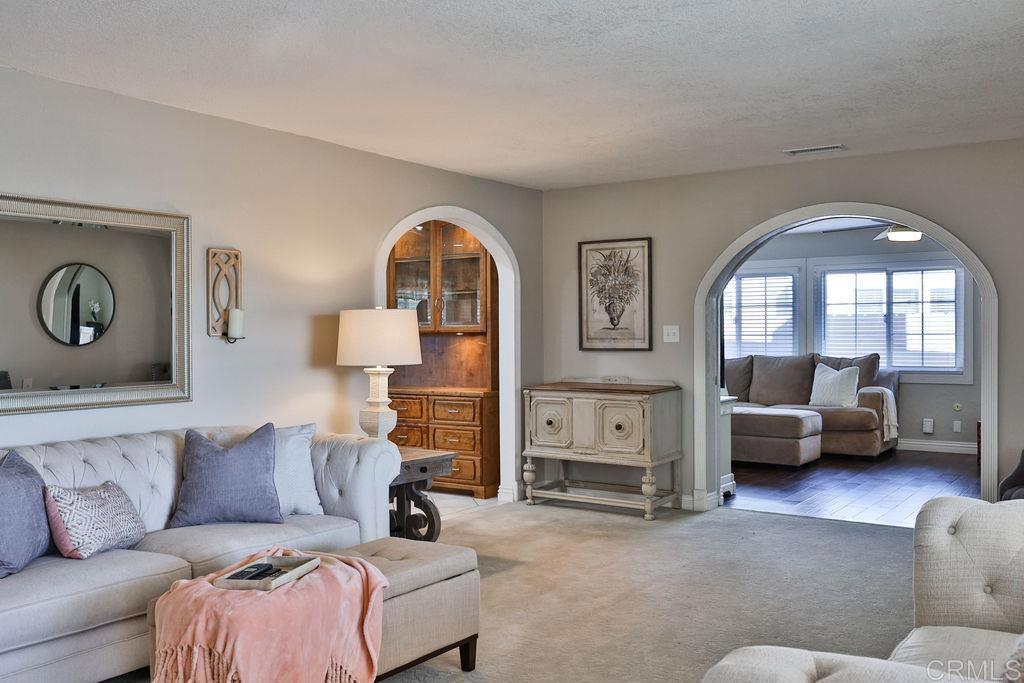 a living room with furniture and a view of living room