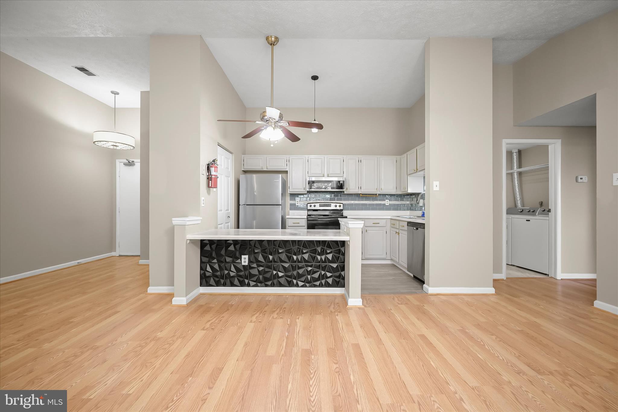 12309 Silvergate Way, Unit 908K Germantown, MD 20874 - Photo 8 of 37 a view of kitchen with wooden floor