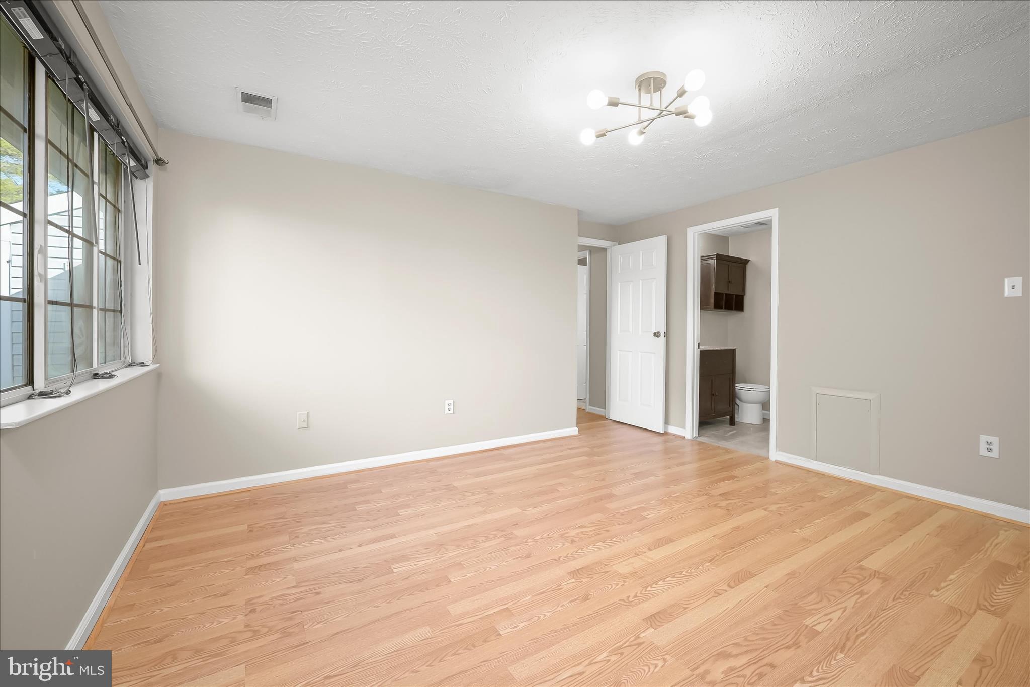 12309 Silvergate Way, Unit 908K Germantown, MD 20874 - Photo 18 of 37 a view of an empty room with a window