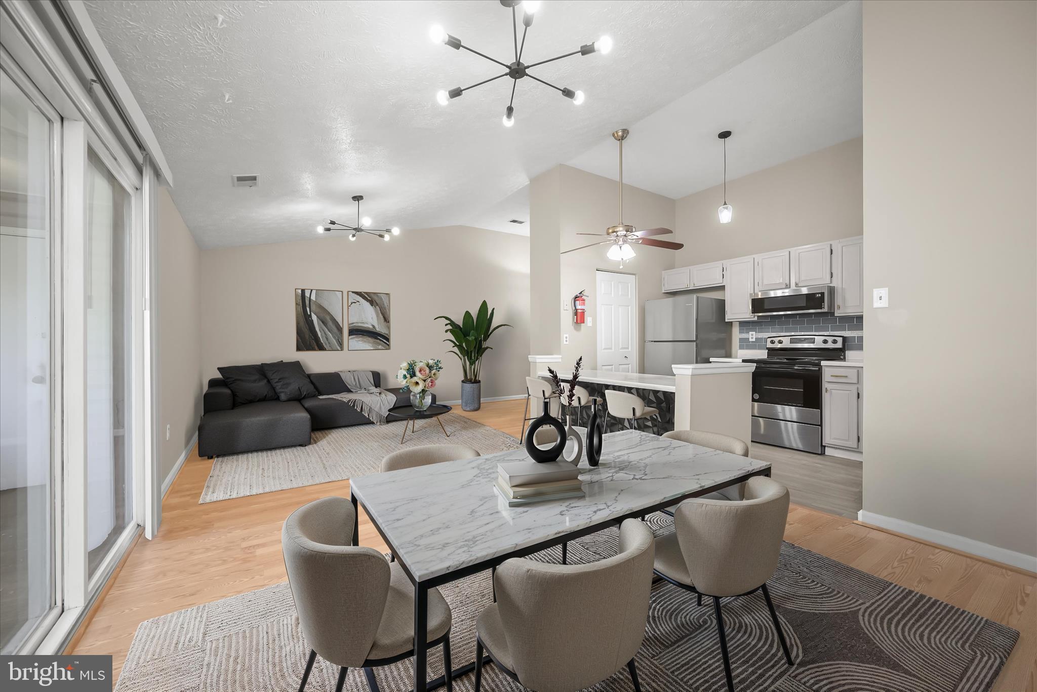 12309 Silvergate Way, Unit 908K Germantown, MD 20874 - Photo 33 of 37 a view of a dining room with furniture