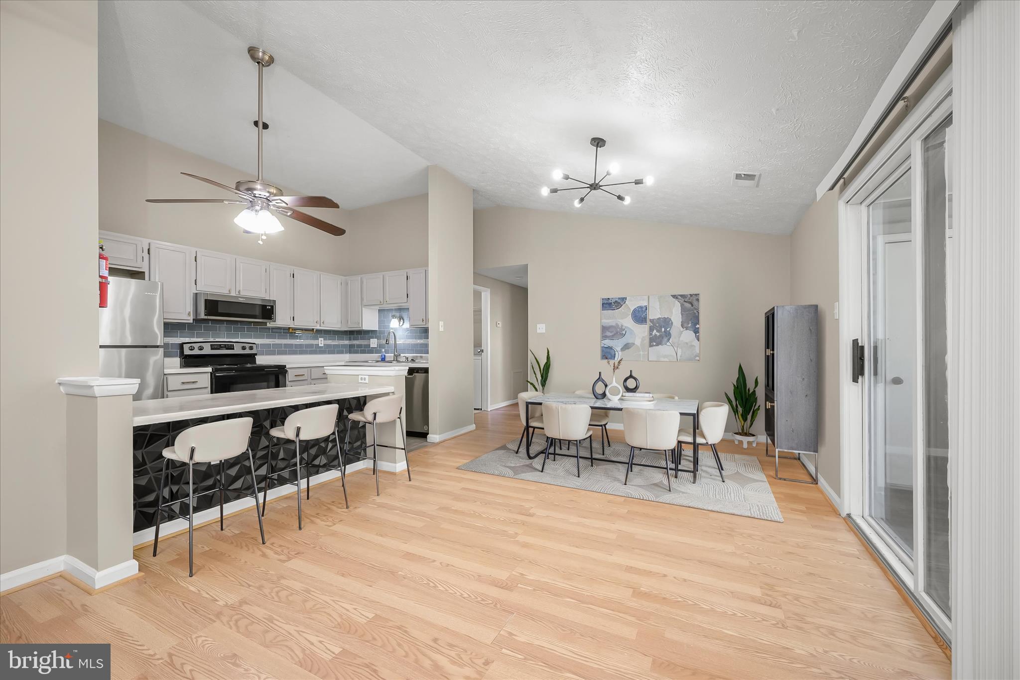 12309 Silvergate Way, Unit 908K Germantown, MD 20874 - Photo 3 of 37 a view of a dining room kitchen and a window
