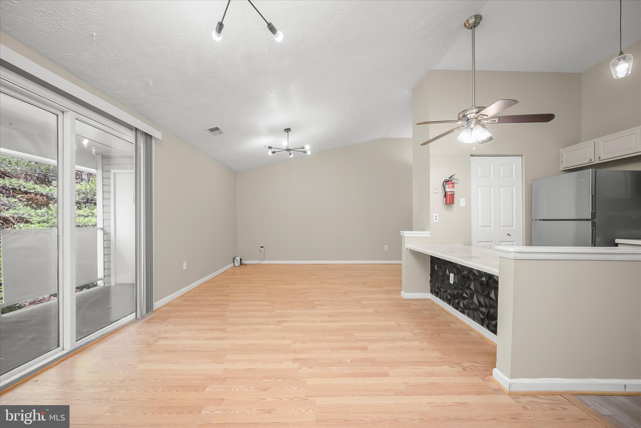 12309 Silvergate Way, Unit 908K Germantown, MD 20874 - Photo 36 of 37 a view of a kitchen with a sink and cabinet area