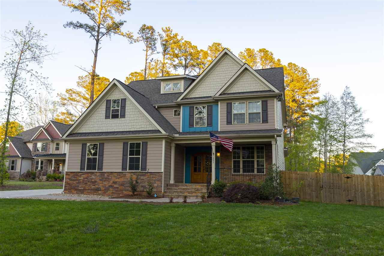 7203 Holly Springs Road Raleigh, NC 27606 - Photo 23 of 25 Hardi Plank & Stone w/Rocking Chair Porch