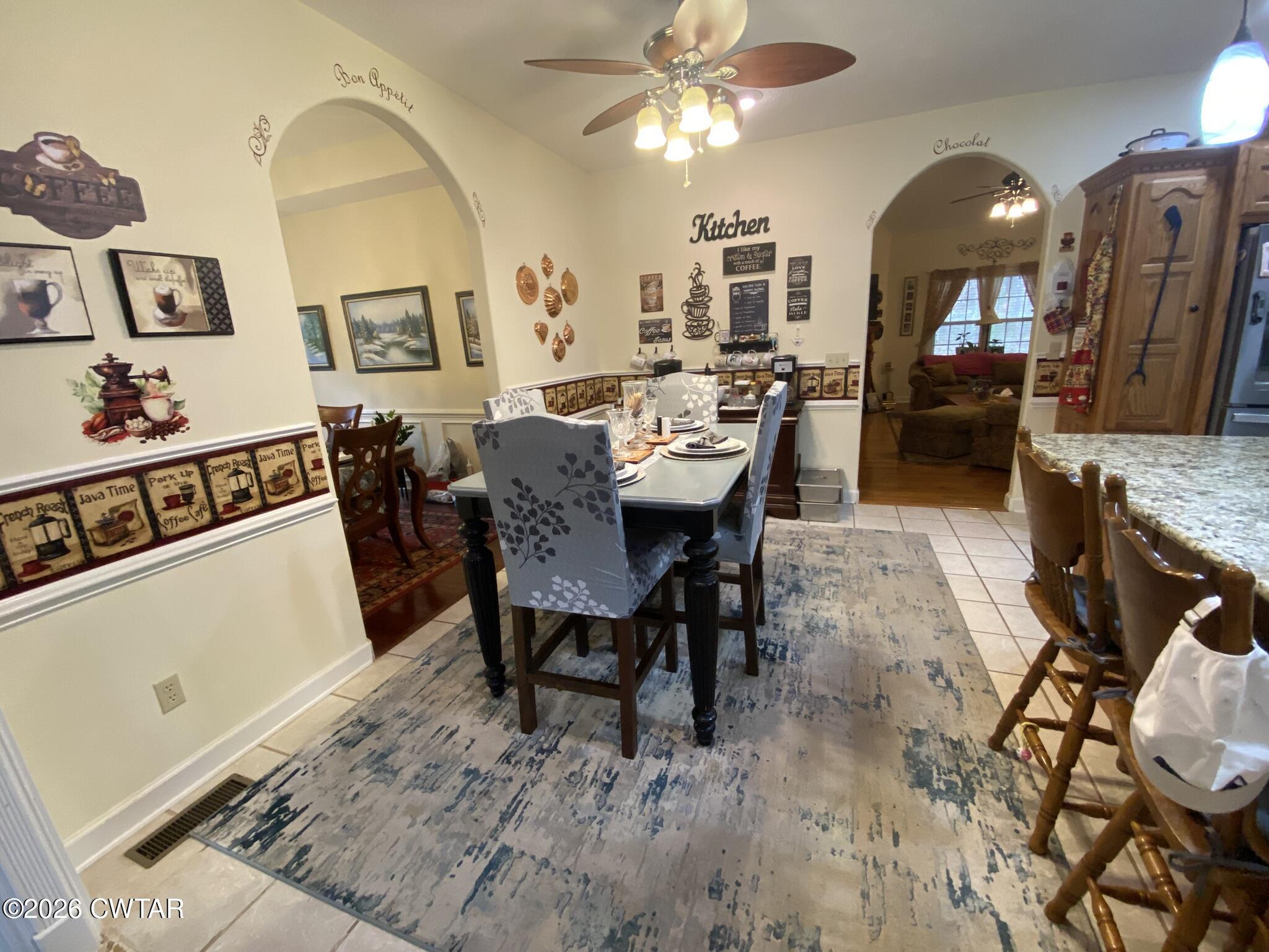 495 Knuckles Road Henderson, TN 38340 - Photo 11 of 80 a view of a dining room with furniture