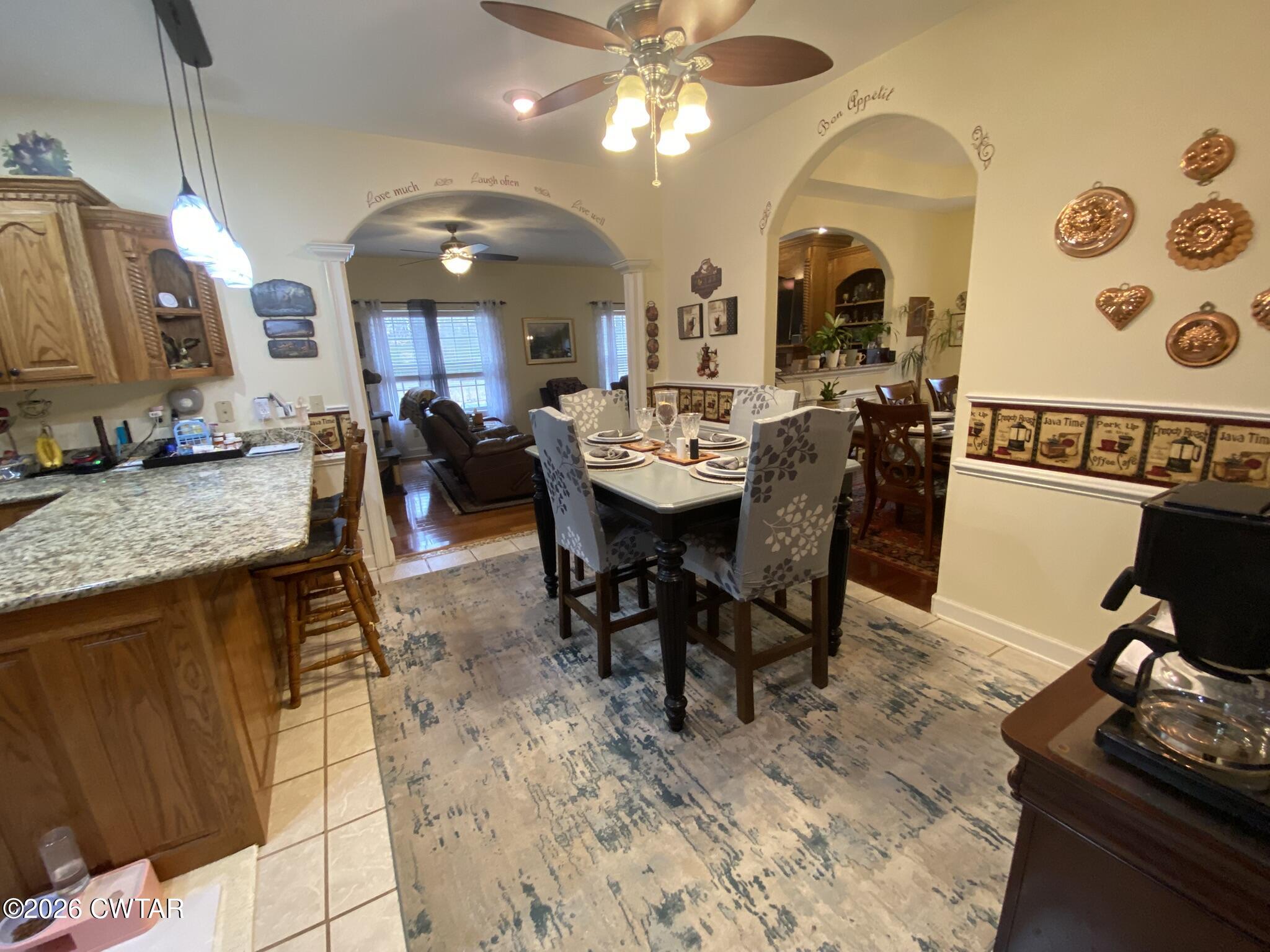 495 Knuckles Road Henderson, TN 38340 - Photo 16 of 80 a view of a dining room with furniture