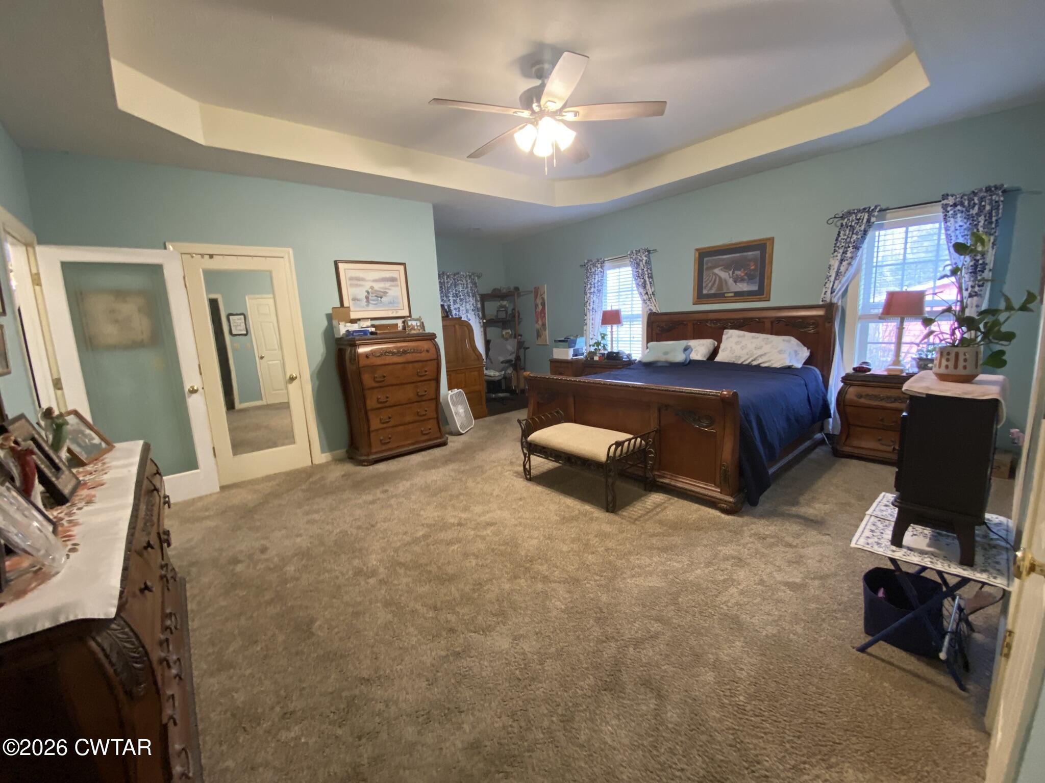 495 Knuckles Road Henderson, TN 38340 - Photo 34 of 80 a living room with furniture and a flat screen tv