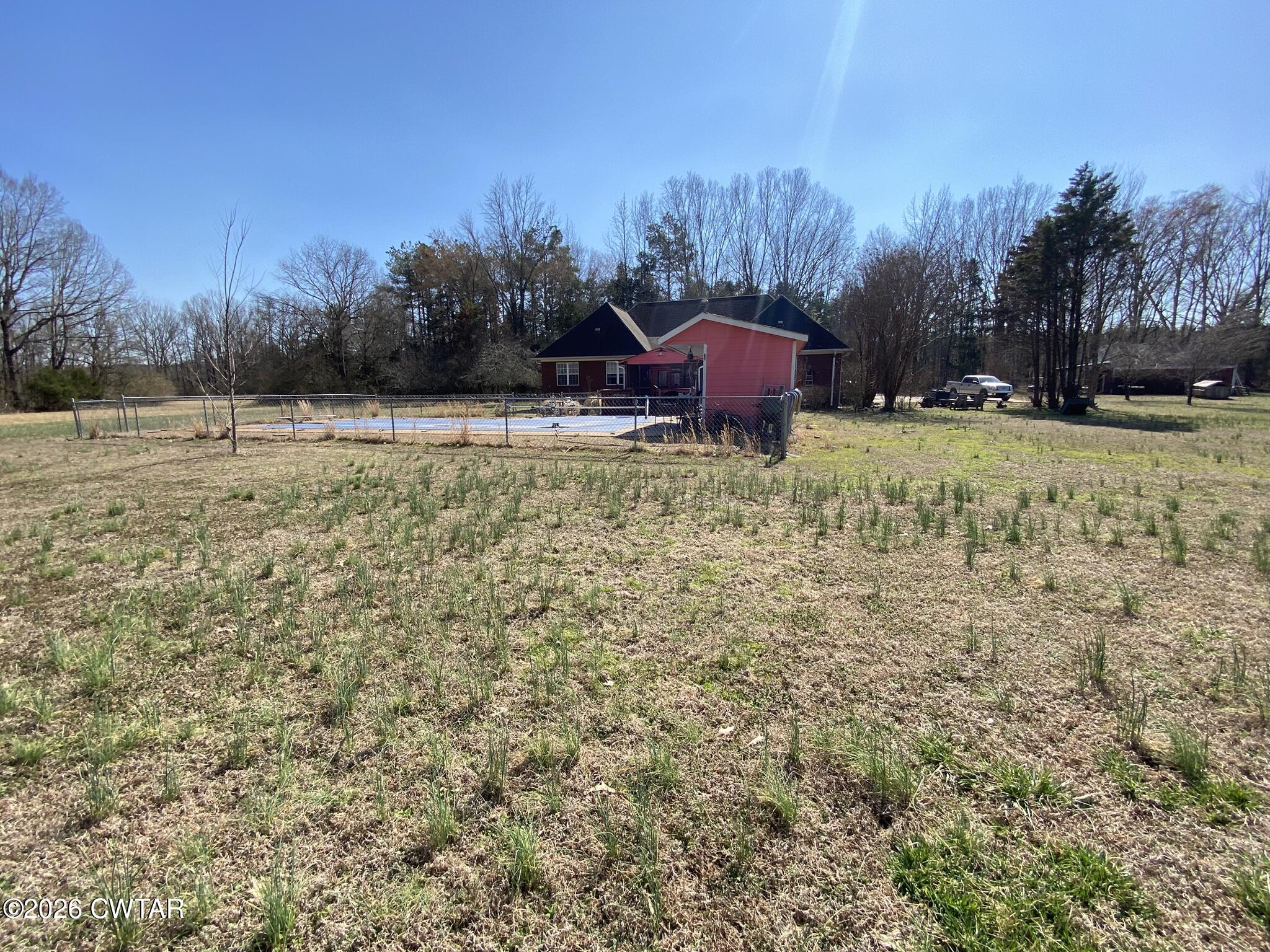 495 Knuckles Road Henderson, TN 38340 - Photo 46 of 80 a view of a yard with large trees