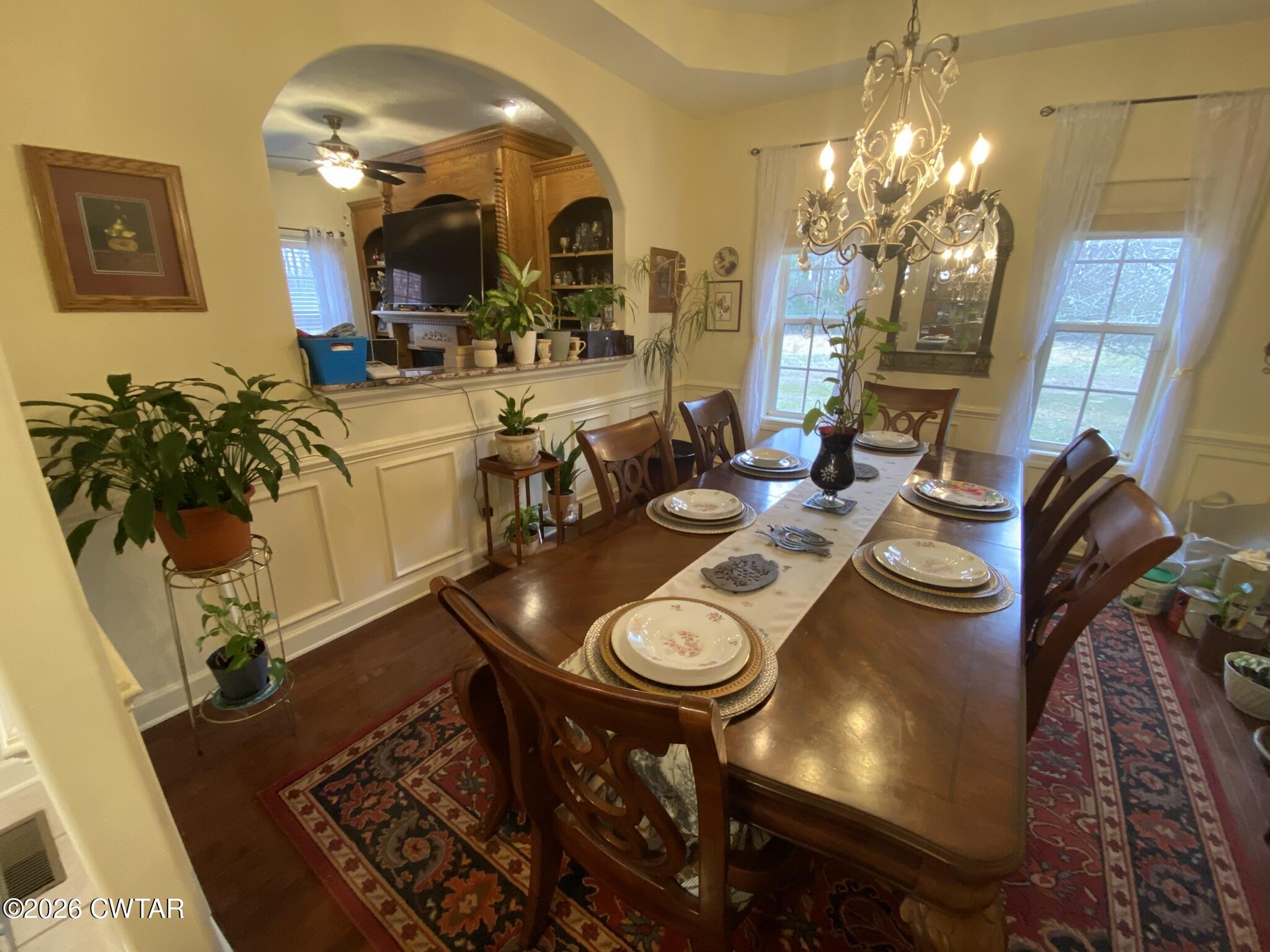 495 Knuckles Road Henderson, TN 38340 - Photo 8 of 80 a view of a dining room with furniture and chandelier