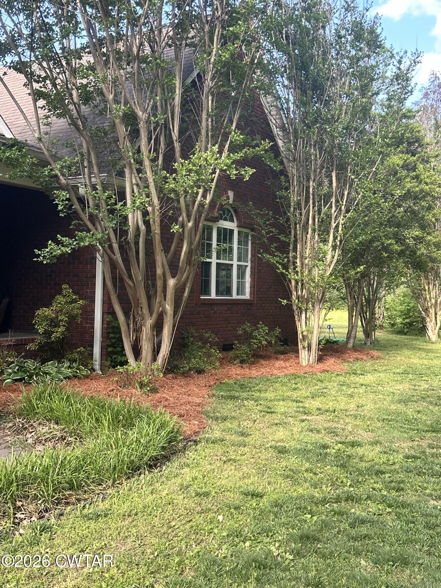 495 Knuckles Road Henderson, TN 38340 - Photo 86 of 90 a view of a house with a yard