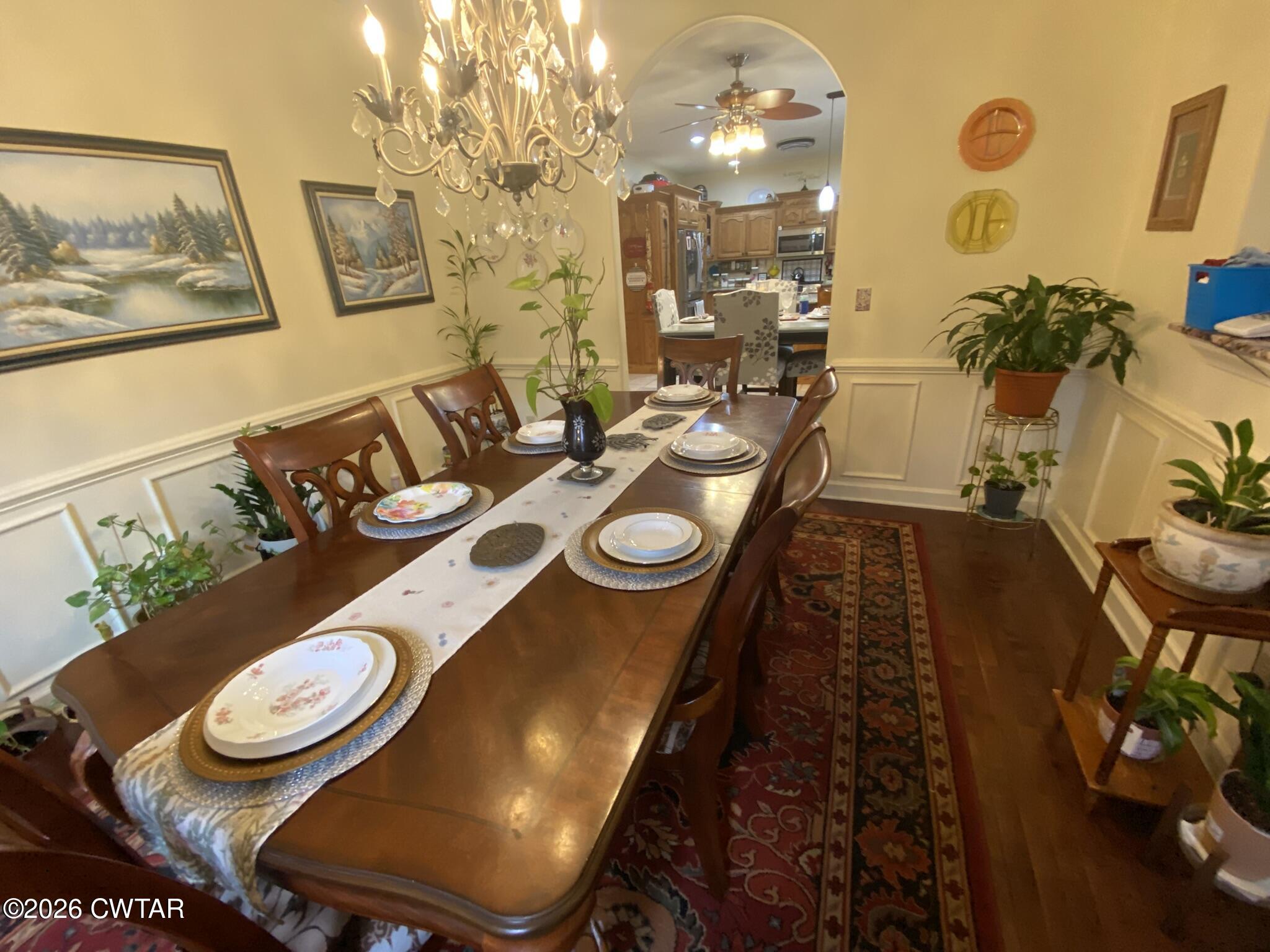 495 Knuckles Road Henderson, TN 38340 - Photo 10 of 80 a dining room with furniture and wooden floor