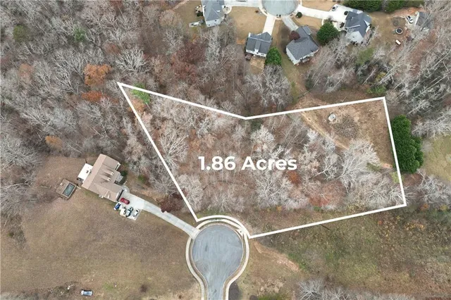 a view of water covered with snow in the background