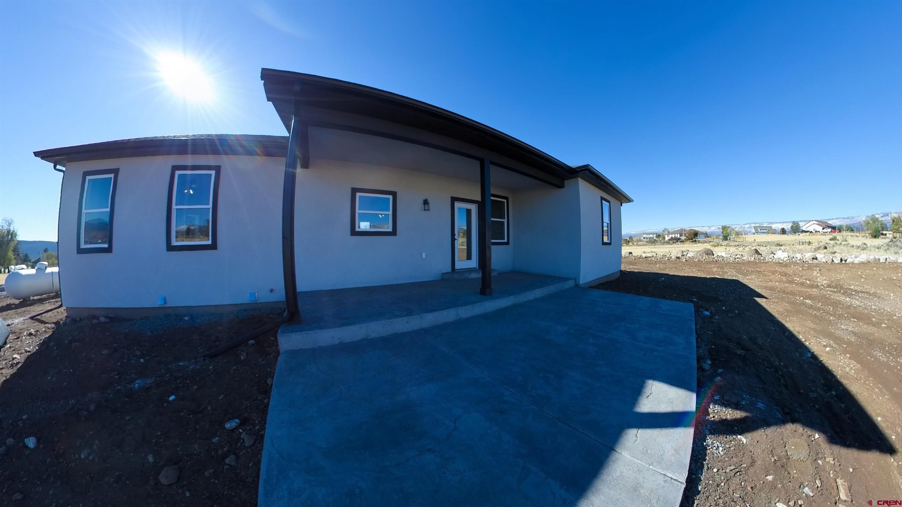 18383 2375 Road Cedaredge, CO 81413 - Photo 13 of 18 a house view with a backyard space