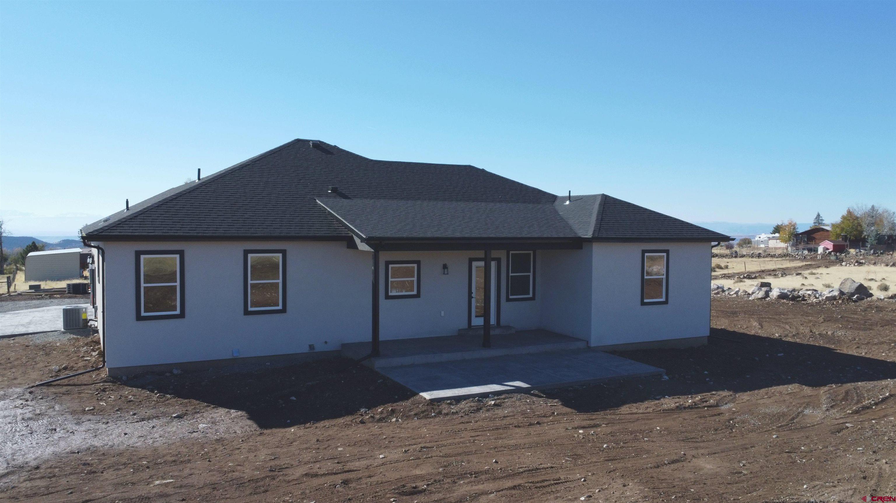 18383 2375 Road Cedaredge, CO 81413 - Photo 10 of 18 a house view with a backyard space