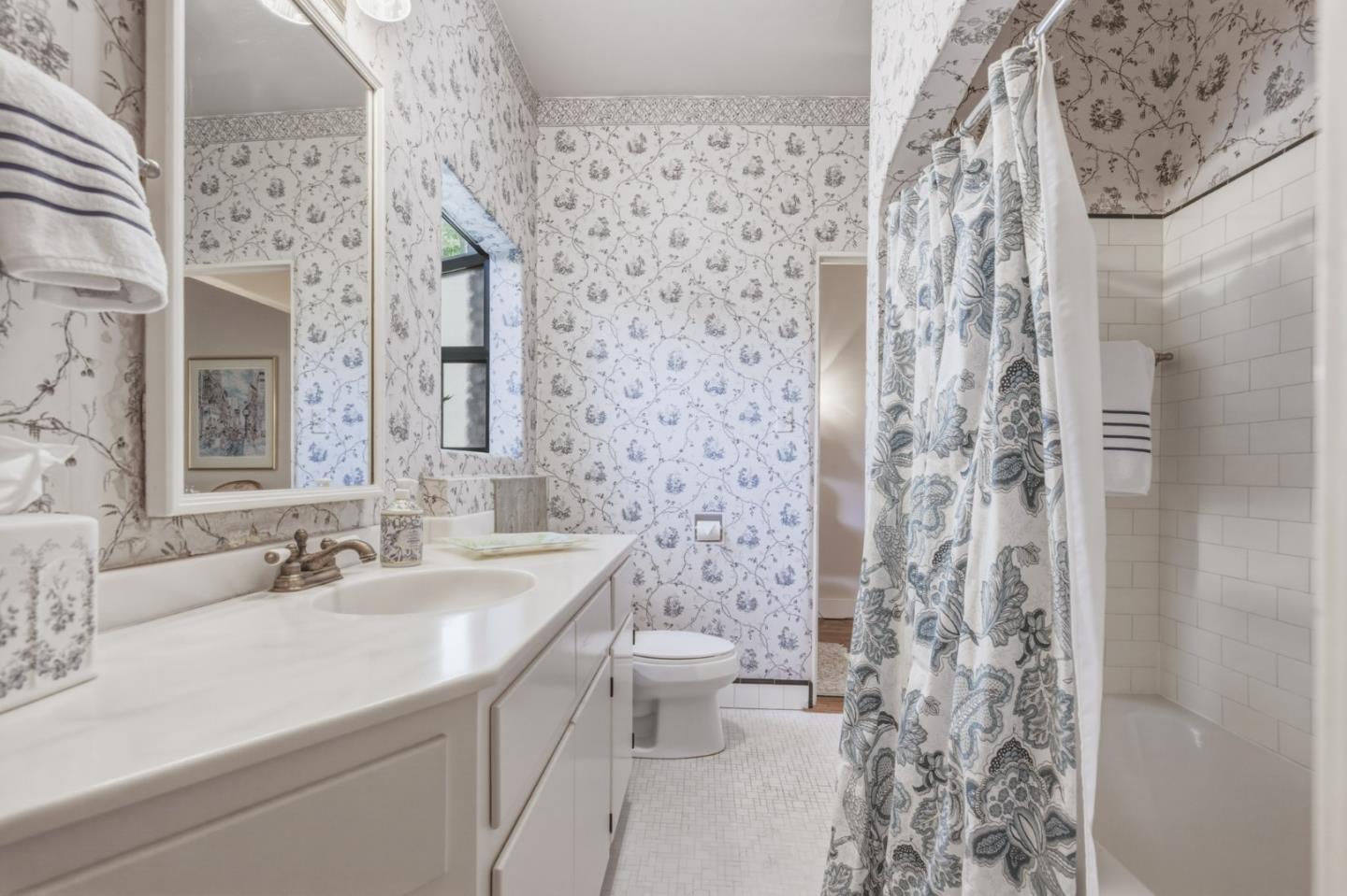 25286 Hatton Road Carmel, CA 93923 - Photo 22 of 34 a bathroom with a sink toilet and shower