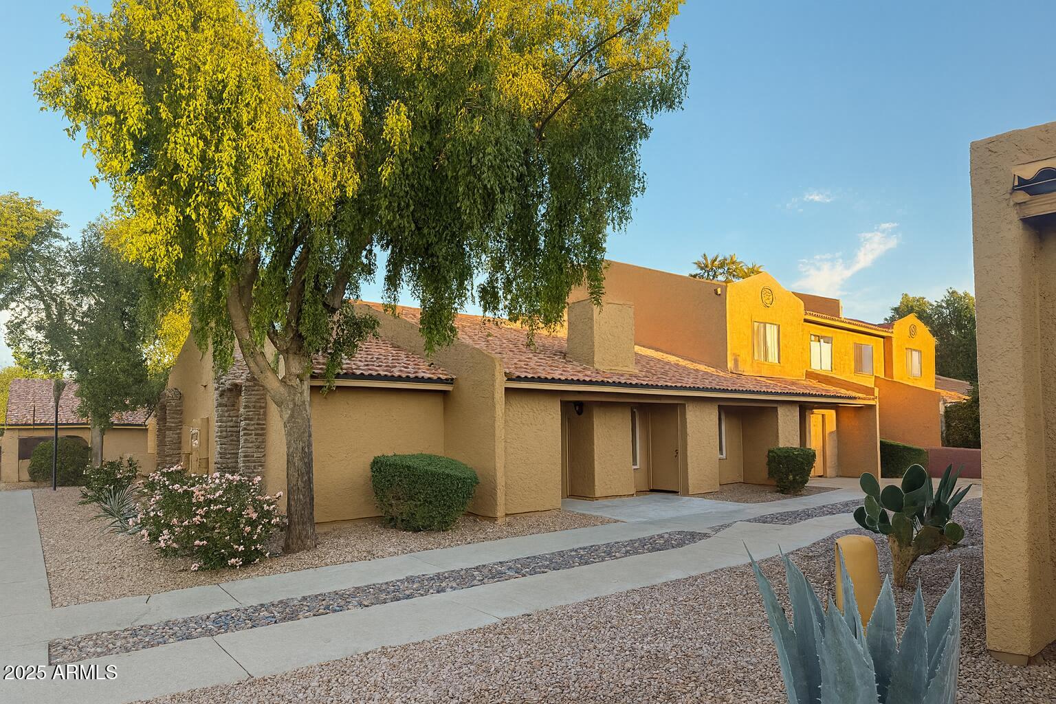 3511 East Baseline Road, Unit 1213 Phoenix, AZ 85042 - Photo 1 of 19 a front view of a house