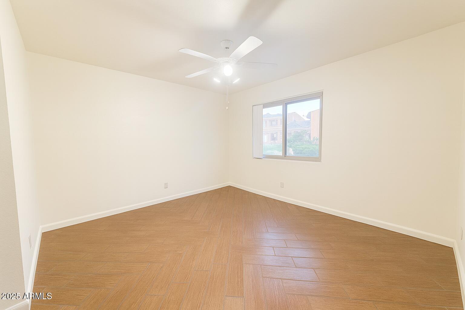 3511 East Baseline Road, Unit 1213 Phoenix, AZ 85042 - Photo 14 of 19 an empty room with a window
