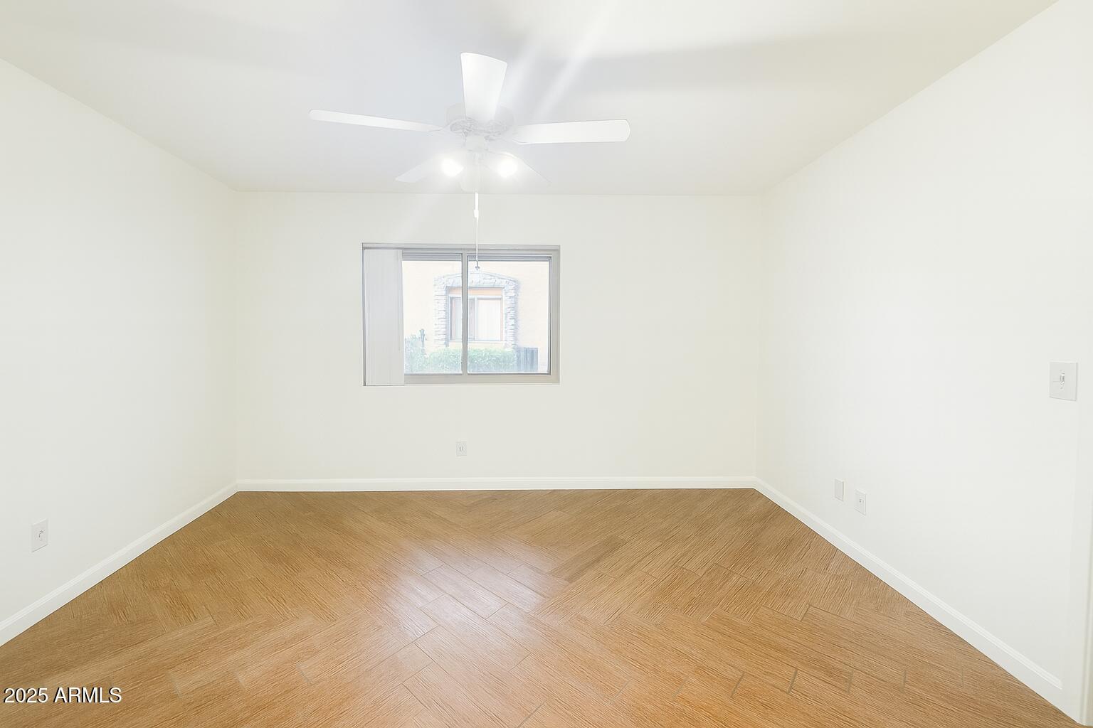 3511 East Baseline Road, Unit 1213 Phoenix, AZ 85042 - Photo 15 of 19 an empty room with a empty space and windows
