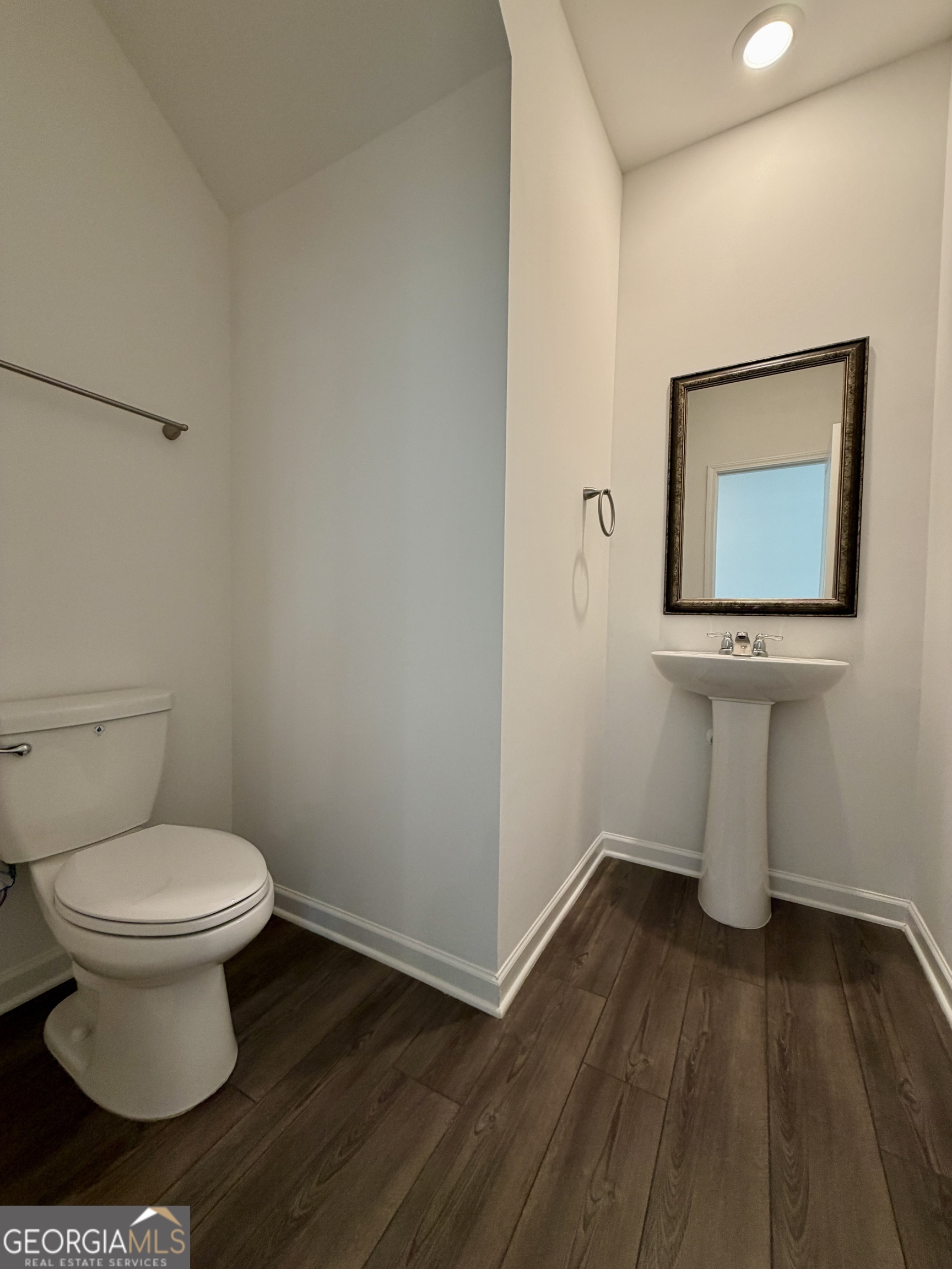 788 Gelderland Drive Hampton, GA 30228 - Photo 12 of 27 a bathroom with a toilet and a sink