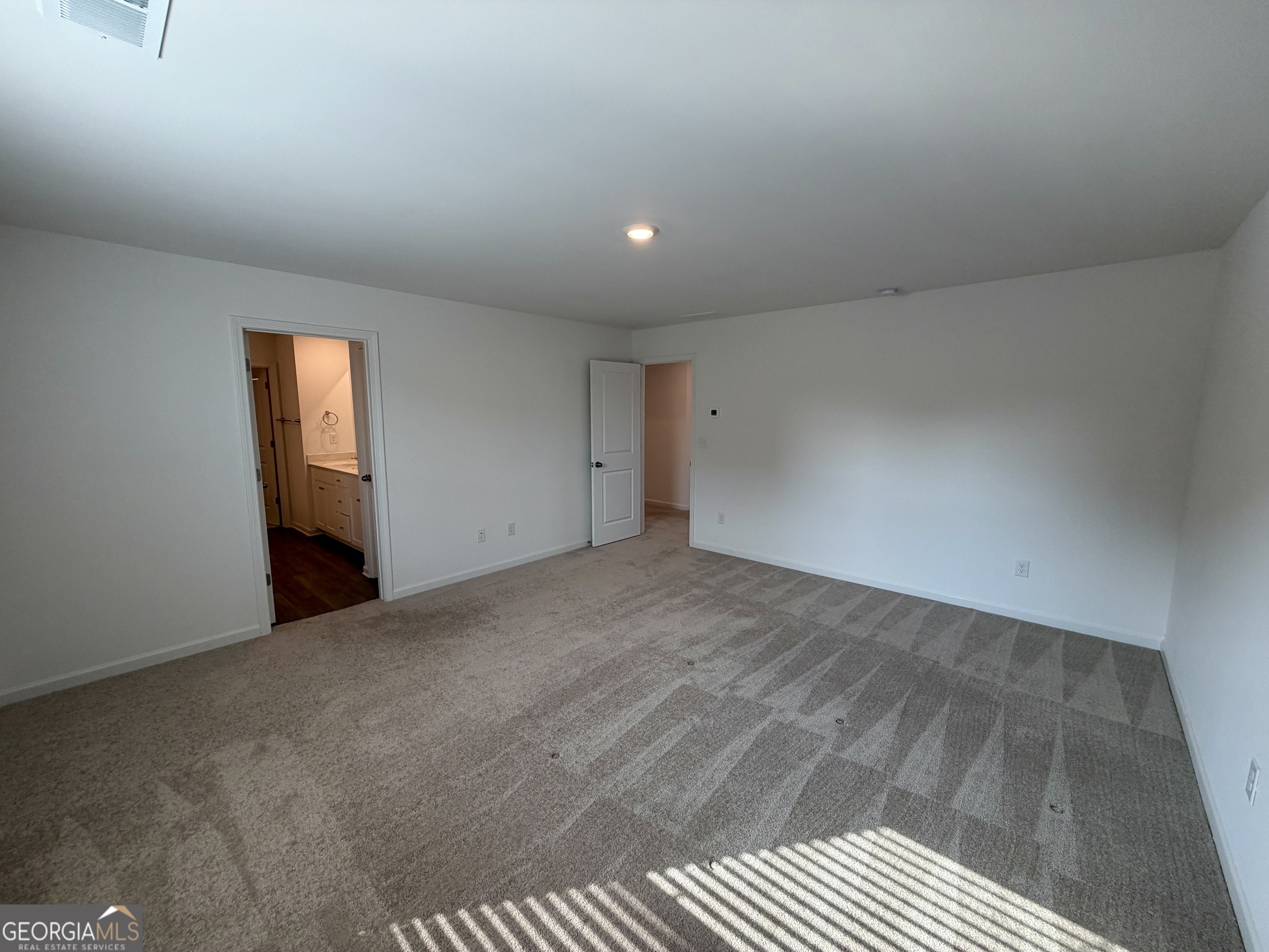 788 Gelderland Drive Hampton, GA 30228 - Photo 16 of 27 a view of an empty room and window