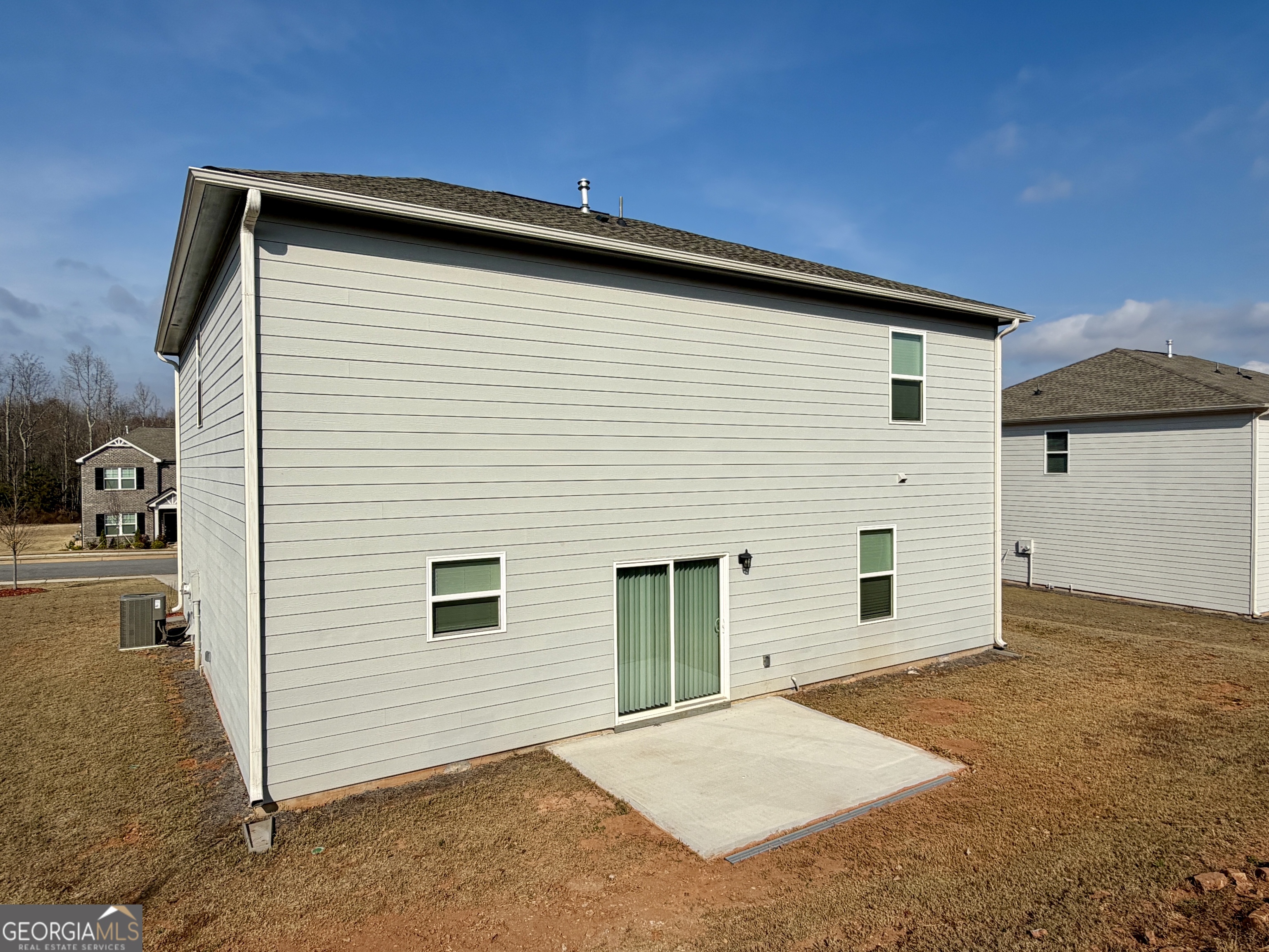 788 Gelderland Drive Hampton, GA 30228 - Photo 2 of 27 a view of backyard of house