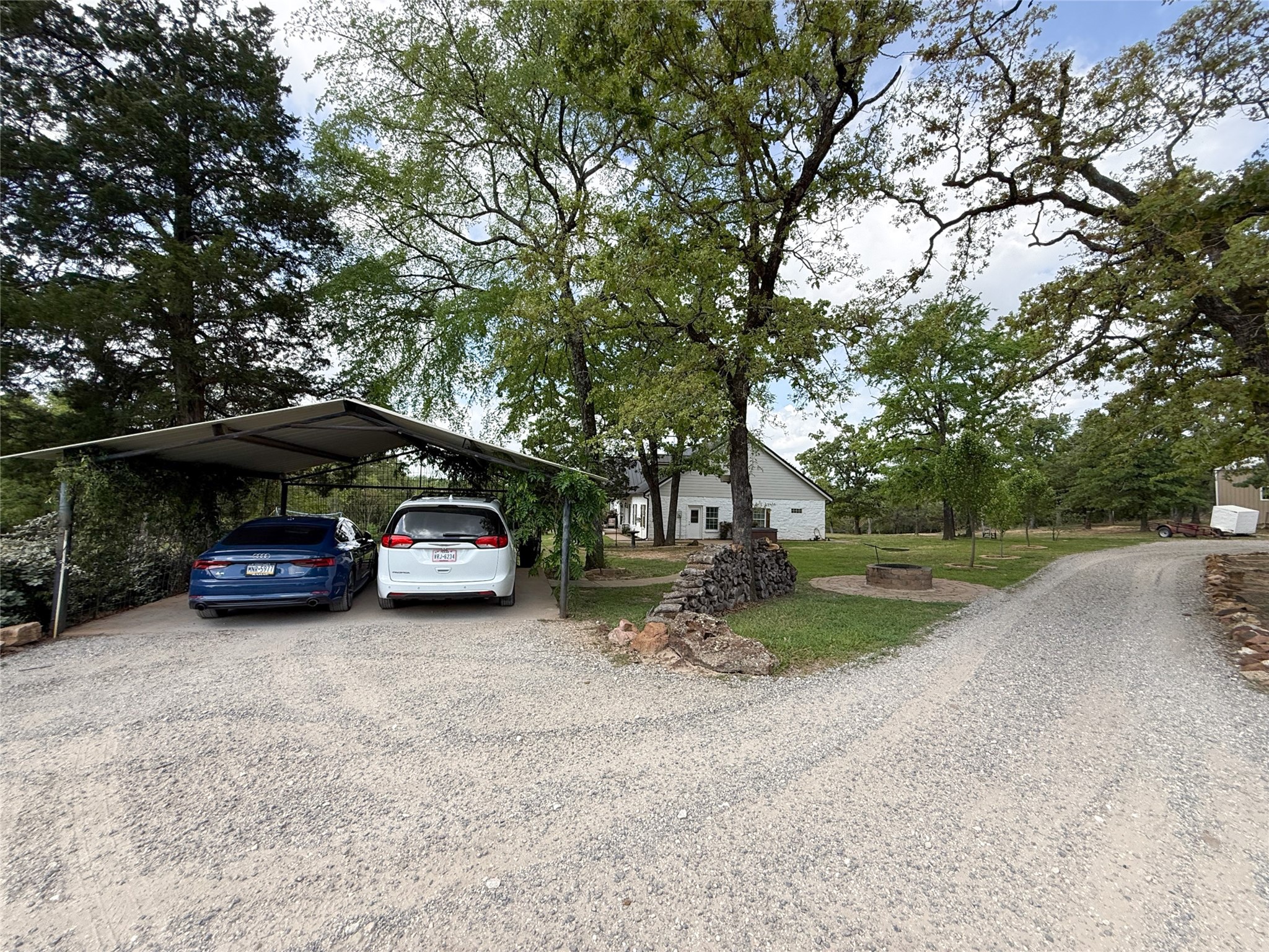 740 Bridget Avenue Buffalo, TX 75831 - Photo 10 of 50 a view of a car parked in back of a white house