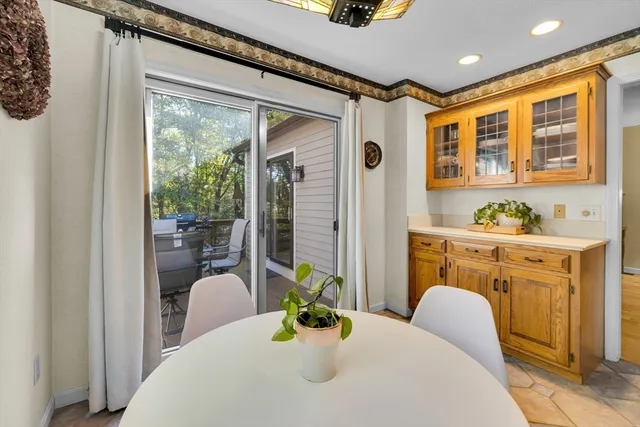a bedroom with furniture and a chandelier