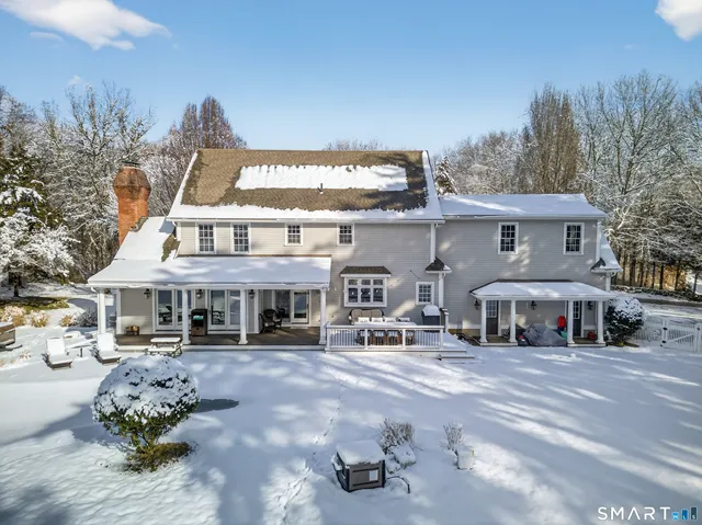 a front view of a building with many windows