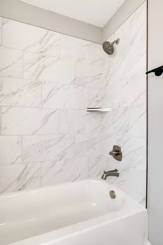 a bathroom with a bathtub