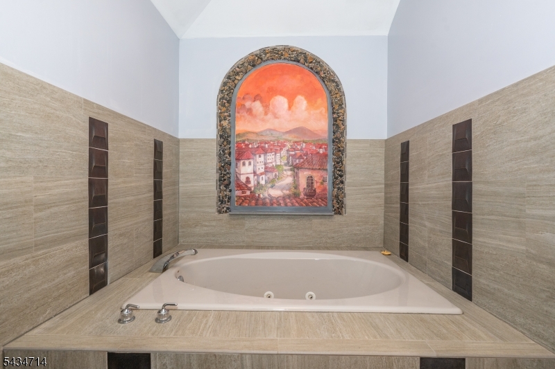 50 Rock Spring Road West Orange, NJ 07052 - Photo 25 of 50 a bath tub sitting next to a window