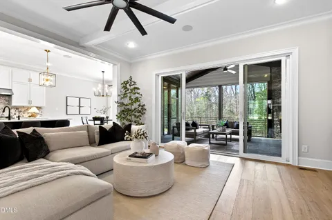 a kitchen with a dining table and chairs