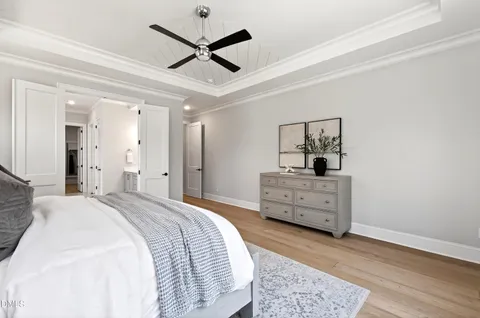 a bedroom with a bed and a closet