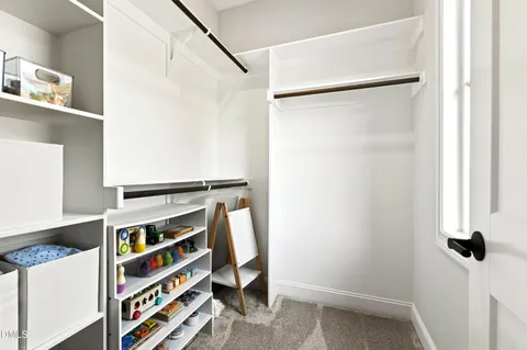 a utility room with cabinets