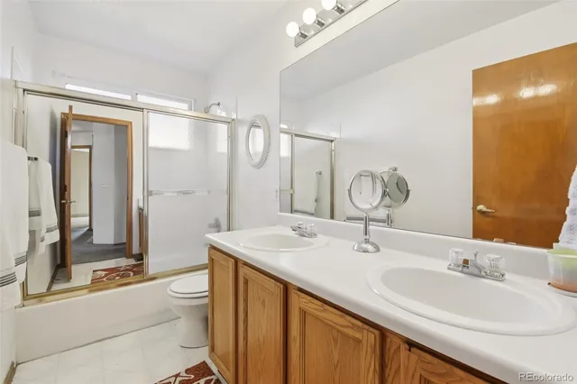 a view of storage and utility room with washer and dryer