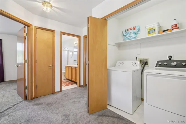 a view of a backyard with wooden fence