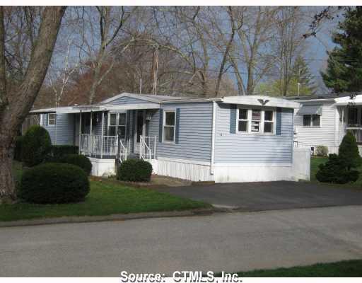 14 Maplewood Road Mansfield, CT 06268 - Photo 1 of 1 a front view of a house with a yard
