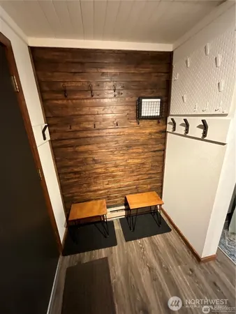 a view of kitchen and wooden floor