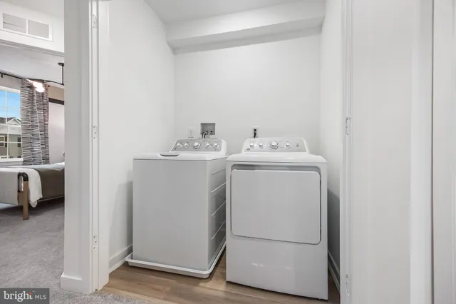 a view of a house with a garden and yard