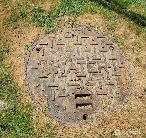 a picture of a bathroom with a picture of a picture
