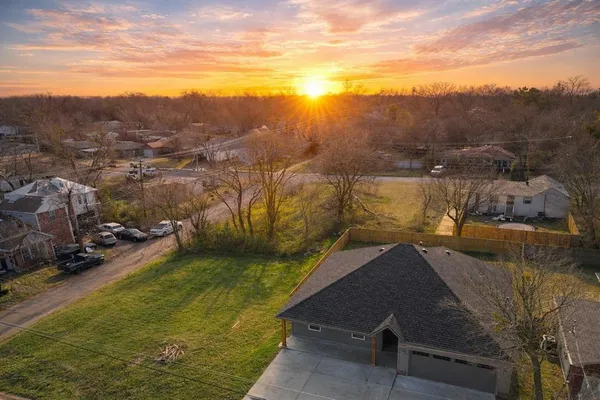 a view of a lake in middle of the town
