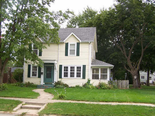 920 North 10th Street Rochelle, IL 61068 - Photo 1 of 10 front view of a house with a yard