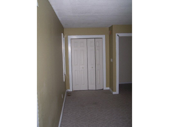 920 North 10th Street Rochelle, IL 61068 - Photo 7 of 10 a view of a room with a hallway