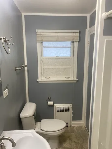 a bathroom with a bath tub