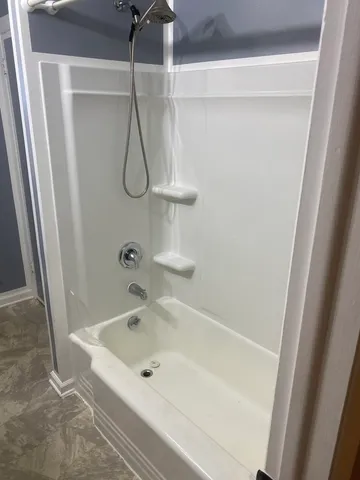 a bathroom with a sink and a bathtub