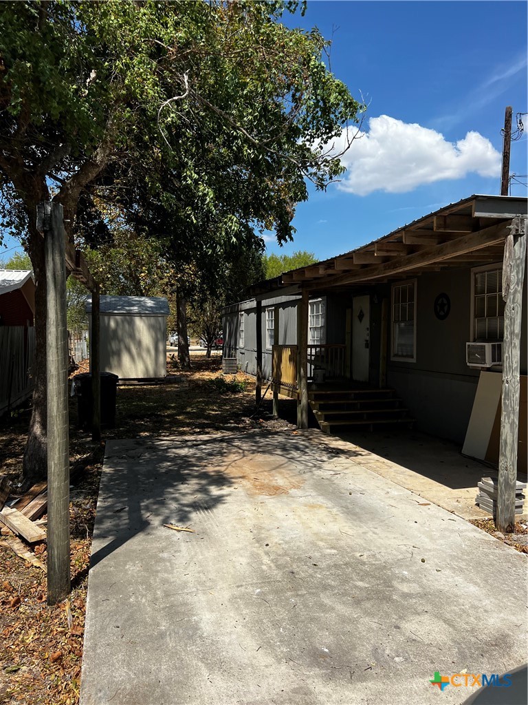 1405 Harris Hill Road, Unit 1405 San Marcos, TX 78666 - Photo 14 of 14 a view of house with yard in snow