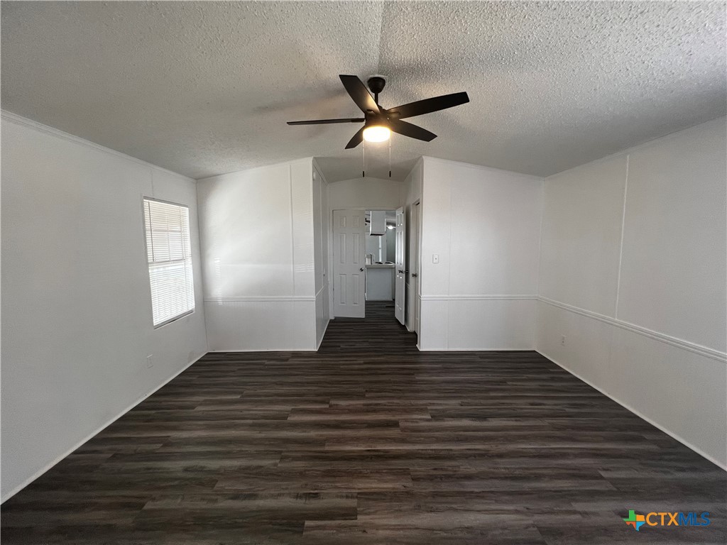 1405 Harris Hill Road, Unit 1405 San Marcos, TX 78666 - Photo 5 of 14 a view of empty room with wooden floor